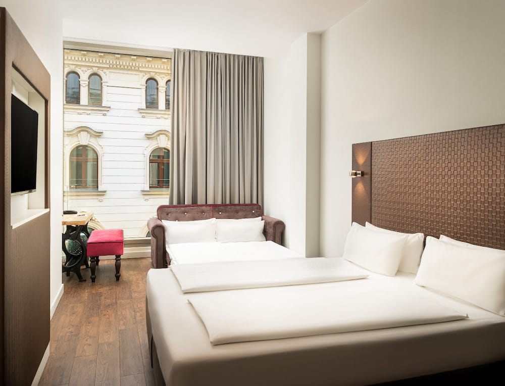 Standard Vierbettzimmer im elaya hotel leipzig city center